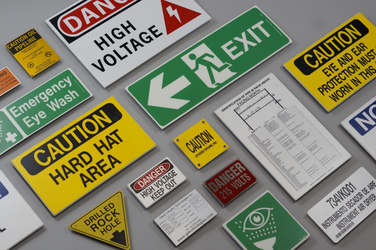 A beautiful display of various operation signs road signs and valve charts on a 45° angle displaying the variety