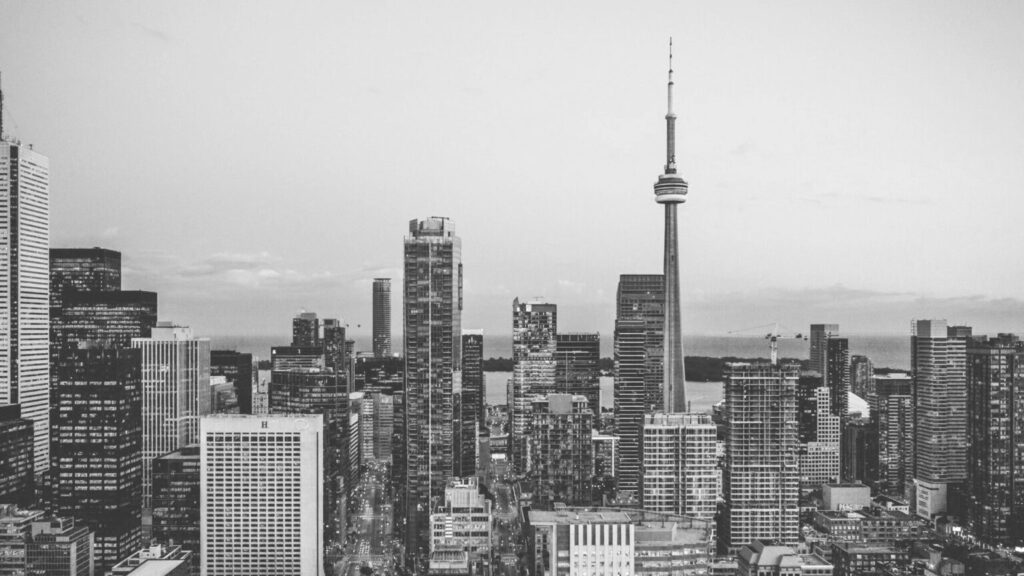 A black and white photo of the Toronto City skyline