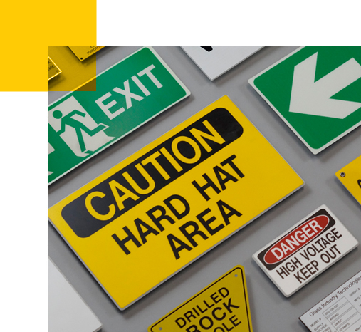 A square cropped out image showcasing a variety of different safety signs for a construction site